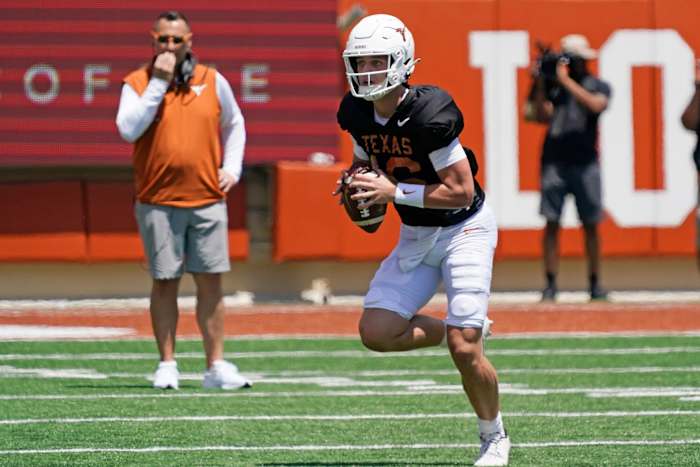 Texas Longhorns quarterback Arch Manning looks to throw a pass.